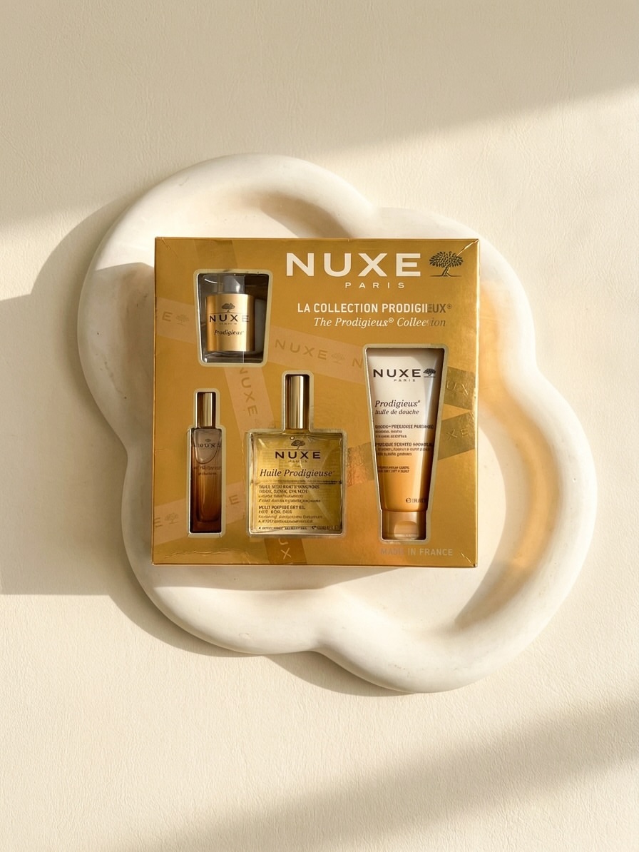 پک هدیه Nuxe شامل شمع معطر، عطر، روغن خشک چندمنظوره، روغن شوینده و معطر بدن با رایحه لوکس